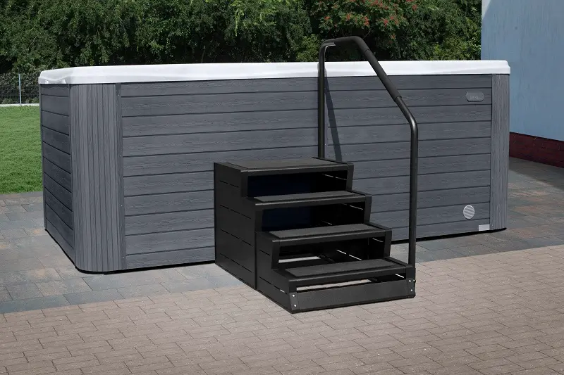 Picture of Wellis Swim Spa Steps next to a luxury hot tub.